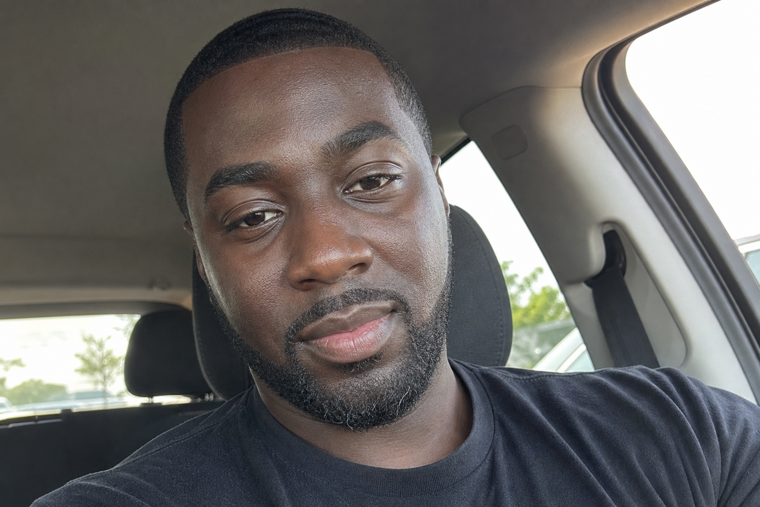 Amateur selfie of Marcus after eyebrow shaping