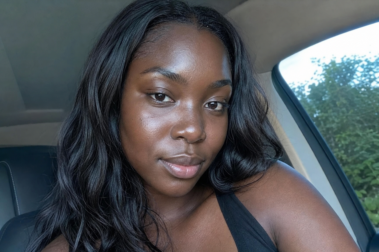 Amateur selfie of Noelle with dewy skin after KREM Spa care